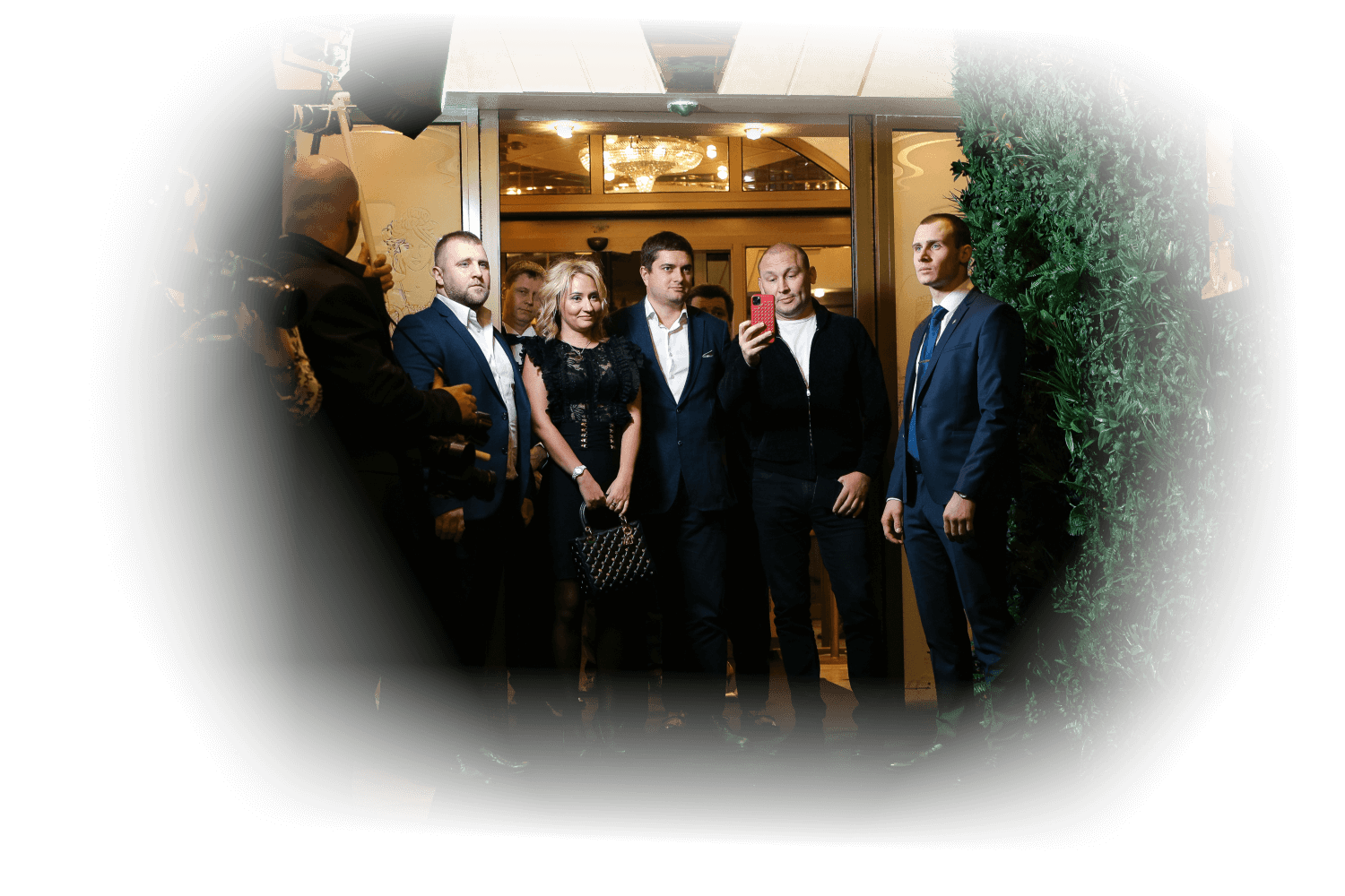 Group standing at a building entrance