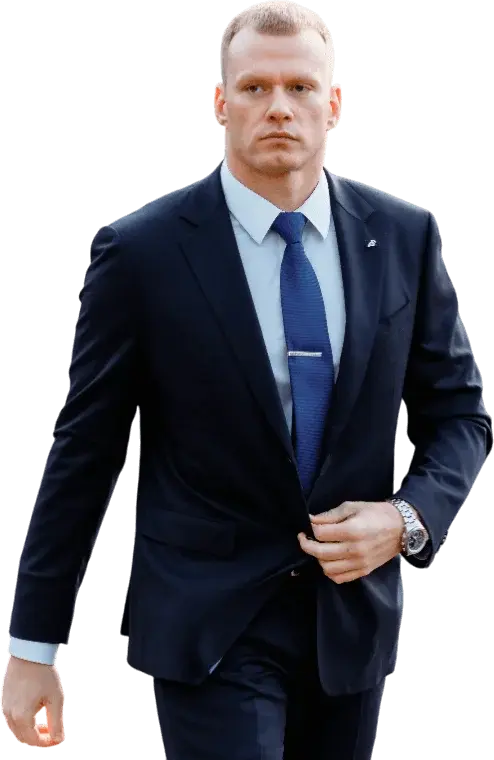 Man in a suit wearing an earpiece