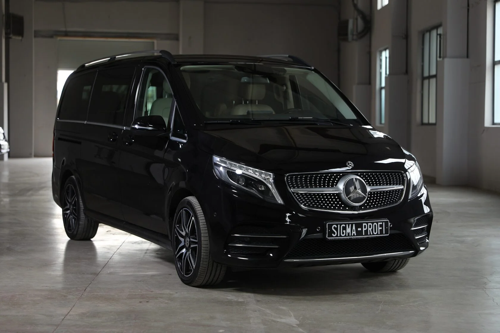 Black Mercedes-Benz passenger van